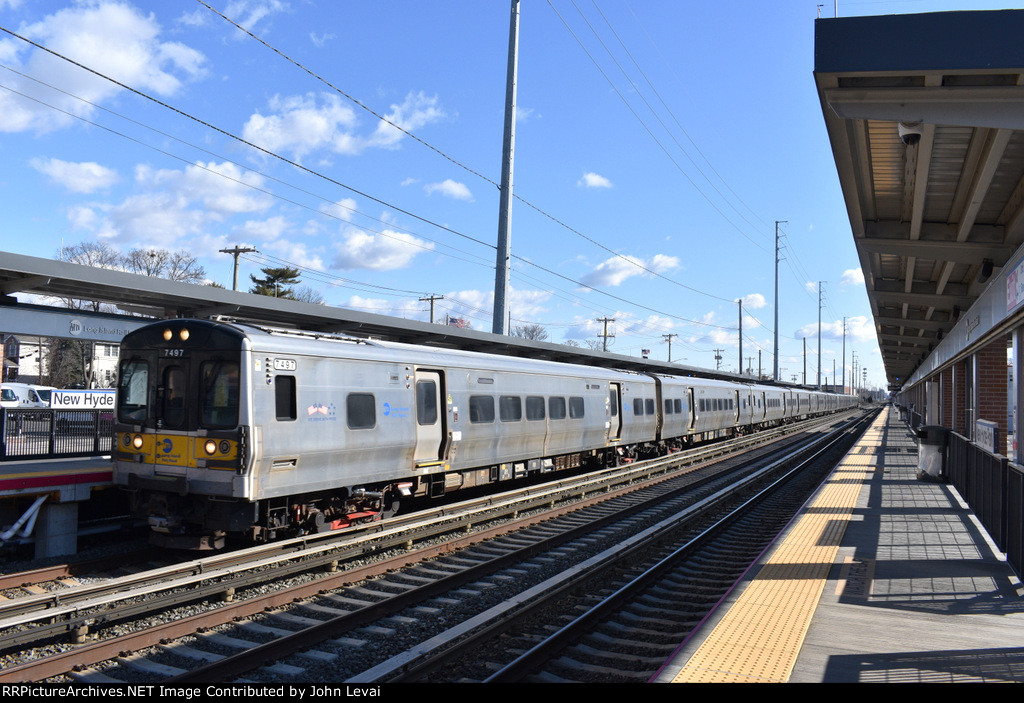 LIRR Train # 7923 with M7 Car # 7497 in the lead 